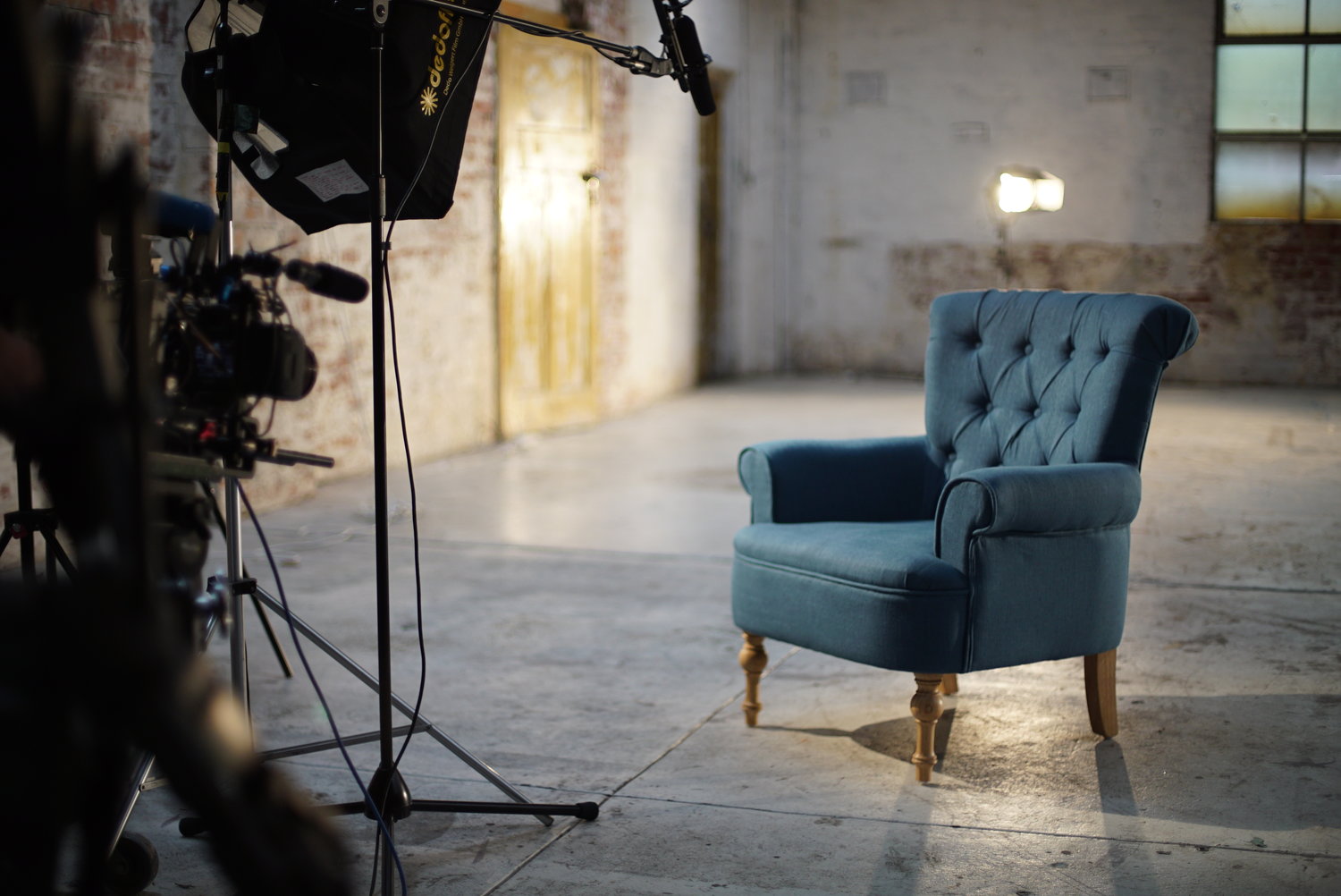 blue chair infront of cameras