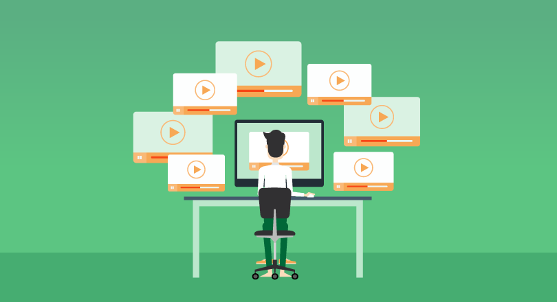 green image of man at computer and multiple screens around him