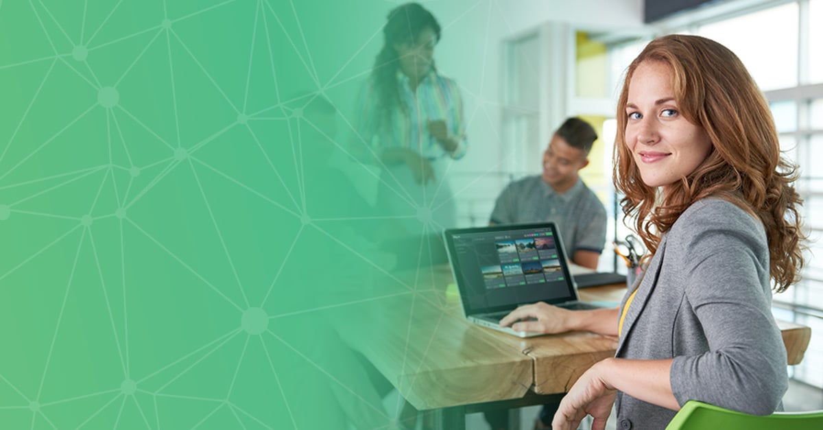 green fade into people sitting at computer