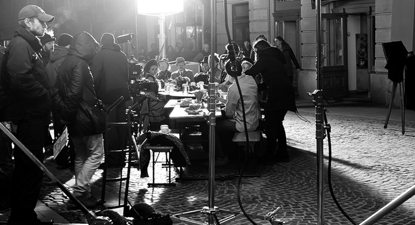 black and white image of people at table