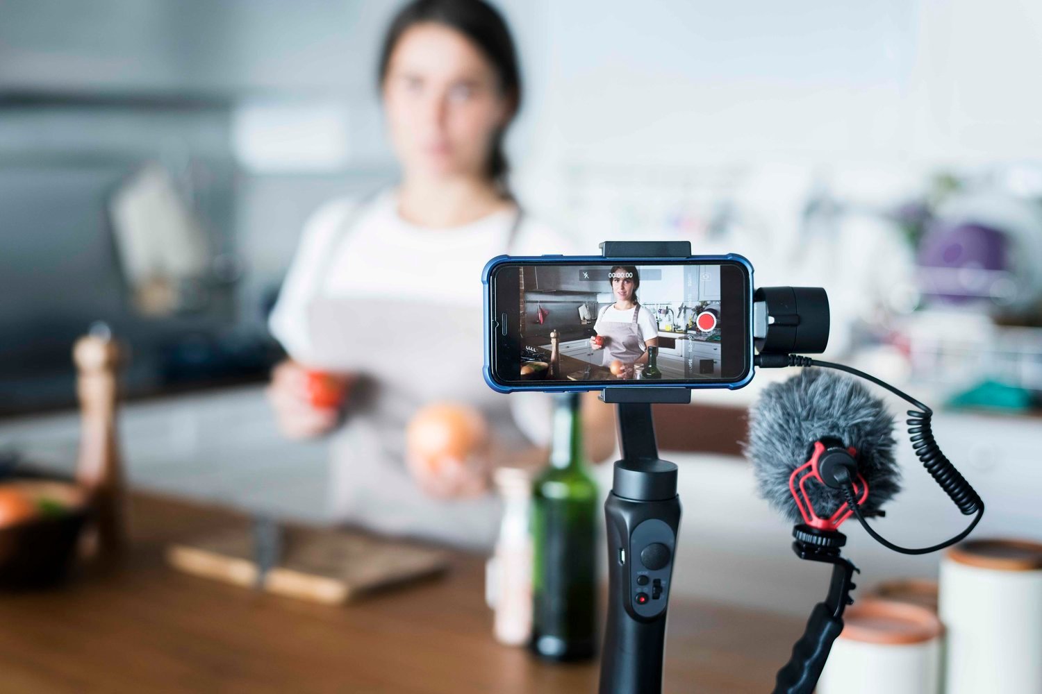 camera videoing person 