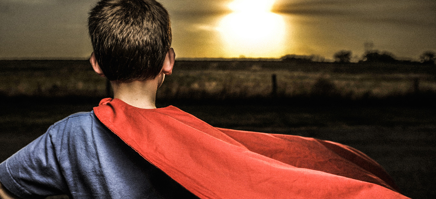 Boy with red cape 