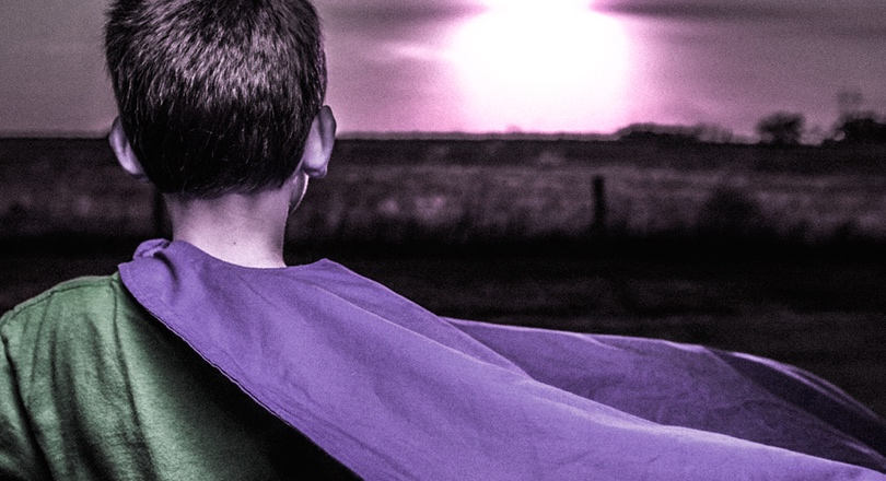 boy with purple cape