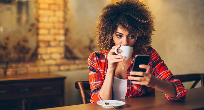 Lady drinking from mug